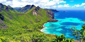 Scenic view of Komodo Island with lush hills and water.